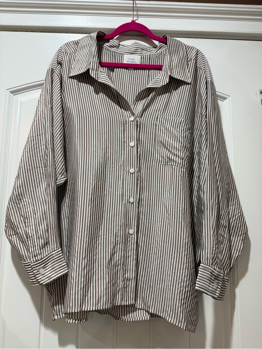 NWOT. Women’s button down shirt